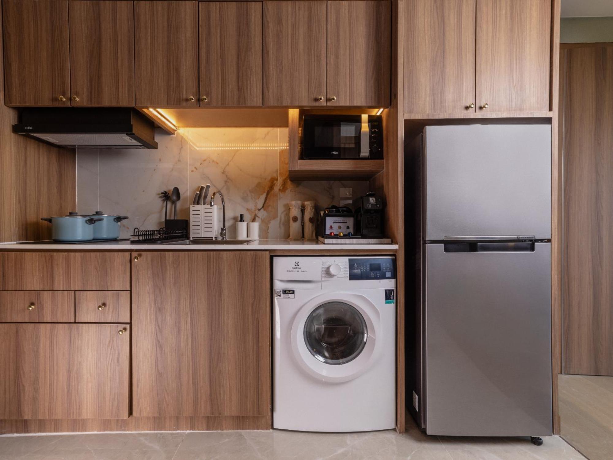 Nysa Hotel Bangkok Sukhumvit 11 エクステリア 写真 A typical kitchen in a serviced apartment